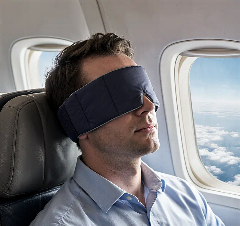 Customer wearing a CalmHug sleep mask